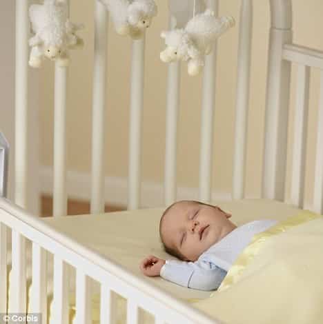 baby sleeping in crib