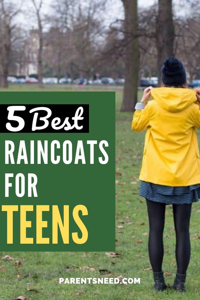 Young teen standing in a yellow raincoat.