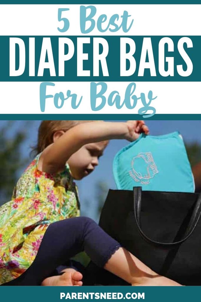 A baby pulling out a diaper bag.