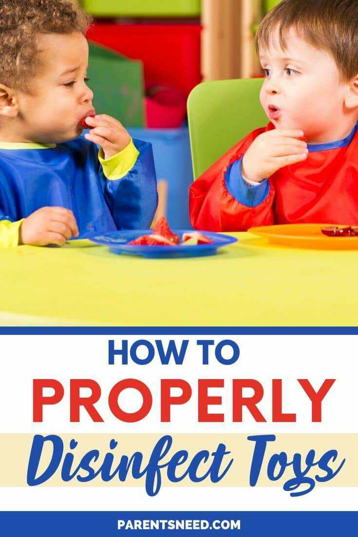 two children putting toys in their mouths