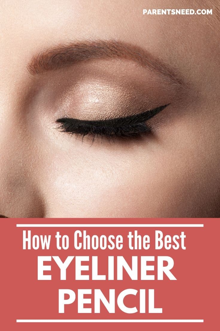 a woman with eyeliner applied with pencil on her left eye
