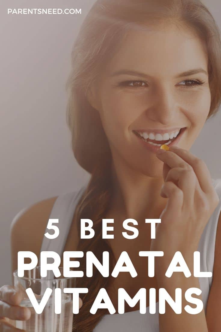 pregnant woman taking her vitamins