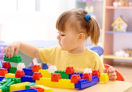 helping your baby achieve certain physical and cognitive milestones