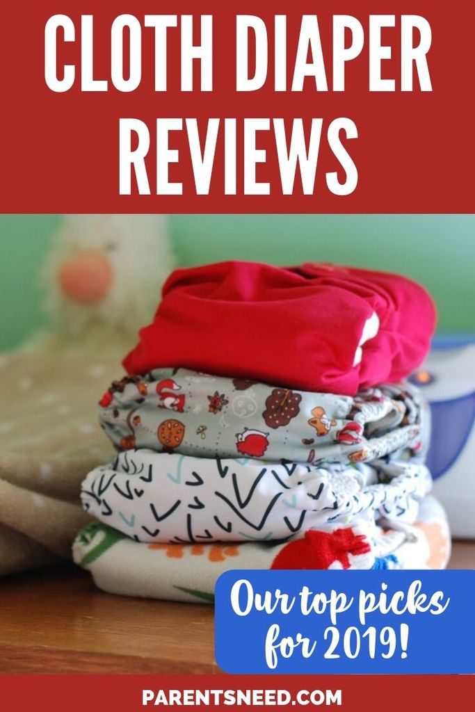 A nicely stacked pile of colorful cloth diapers