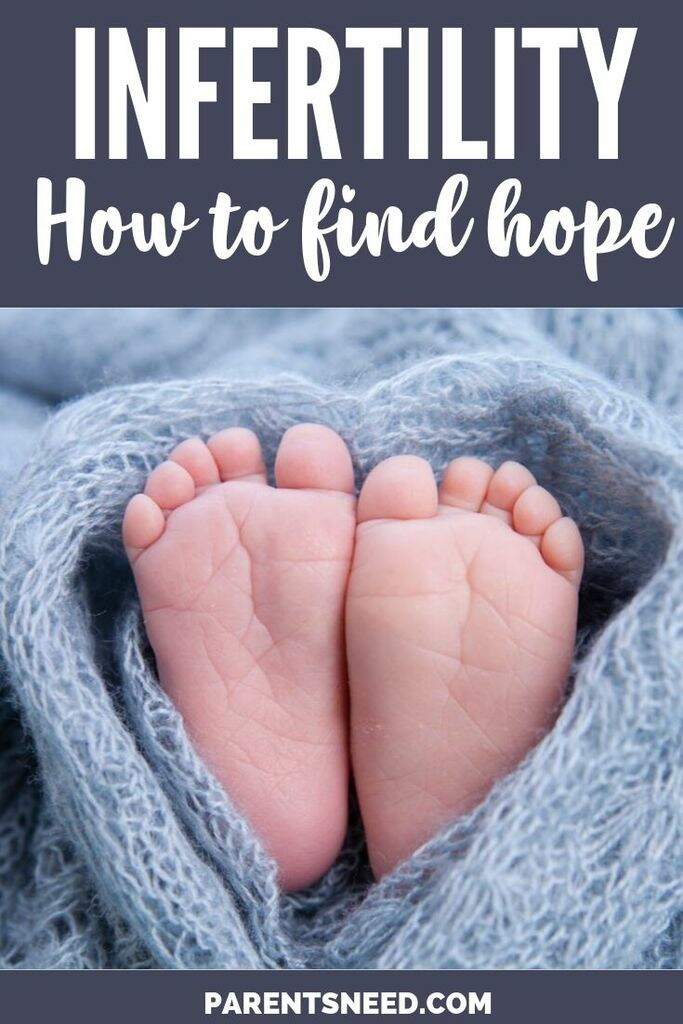 a baby's feet wrapped decoratively in wollen sweater